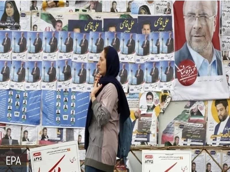 Áp phích giới thiệu các ứng cử viên Tổng thống trên đường phố Iran. Ảnh: EPA