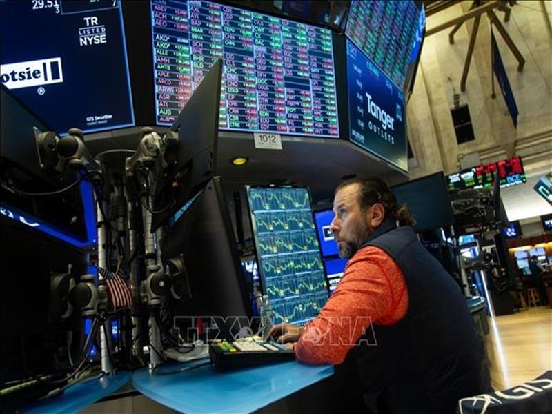 Hoạt động tại Sàn giao dịch chứng khoán New York, Mỹ. (Ảnh: THX/TTXVN)