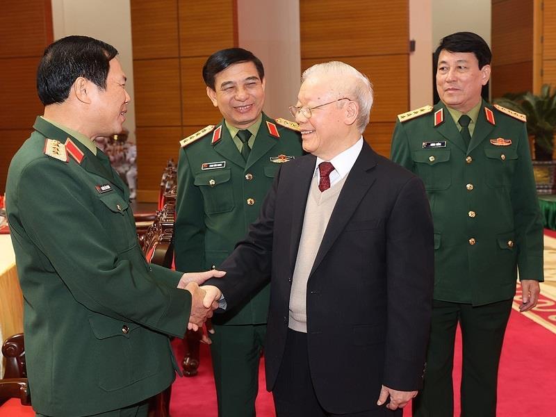Tổng Bí thư Nguyễn Phú Trọng, Bí thư Quân ủy Trung ương cùng các đồng chí lãnh đạo Quân ủy Trung ương, Bộ Quốc phòng dự Hội nghị Quân chính toàn quân năm 2022 _Ảnh: TTXVN